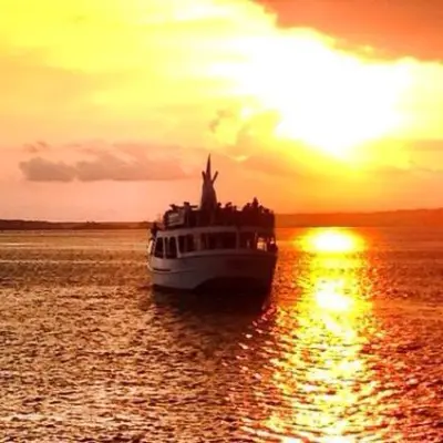 Crabber J II boat at Hilton Head on water at sunset
